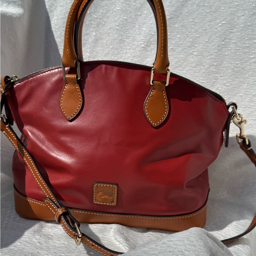 Dooney and Bourne satchel purse with detachable crossbody strap.
